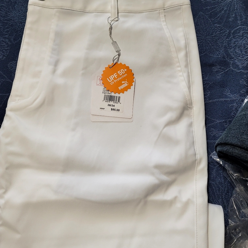 Brand new, white Pumba pants